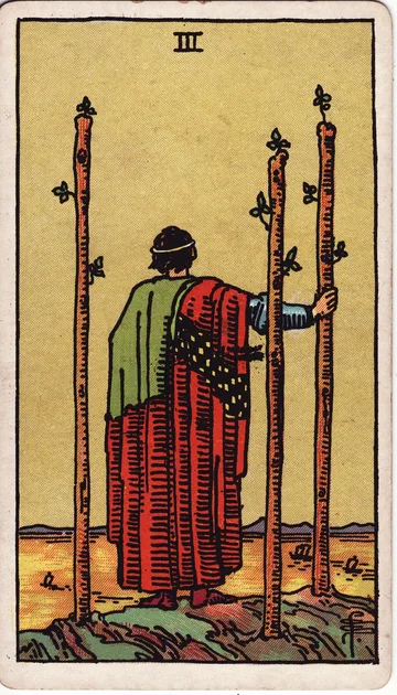 Tres de Bastos — carta del tarot Rider-Waite
